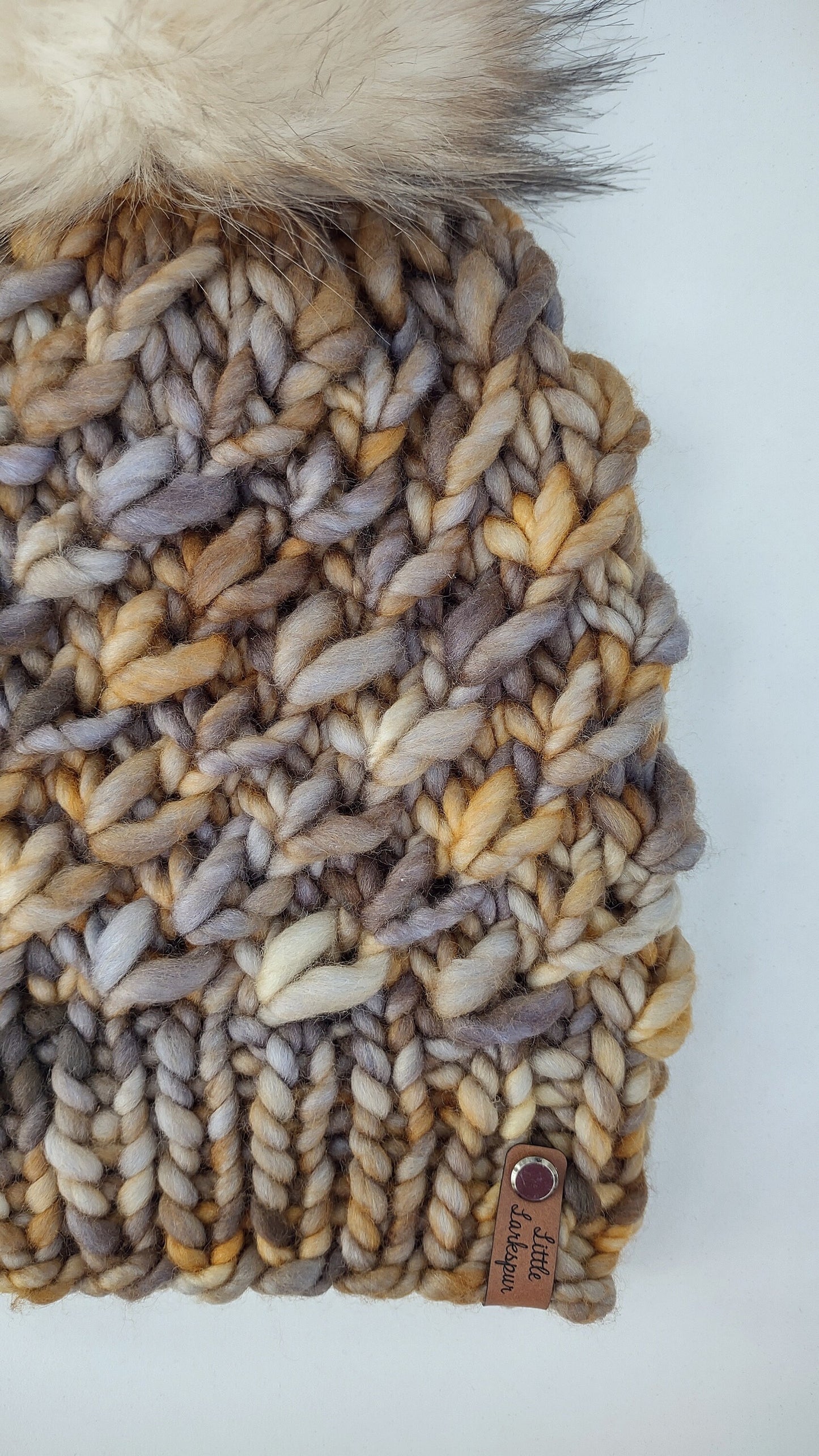 Luxury Adult Merino Wool Hand Knit Hat. Crush Hat. Soft hand knitted hat. Malabrigo Rasta. Honey Mocha brown beanie with faux fur pom pom.