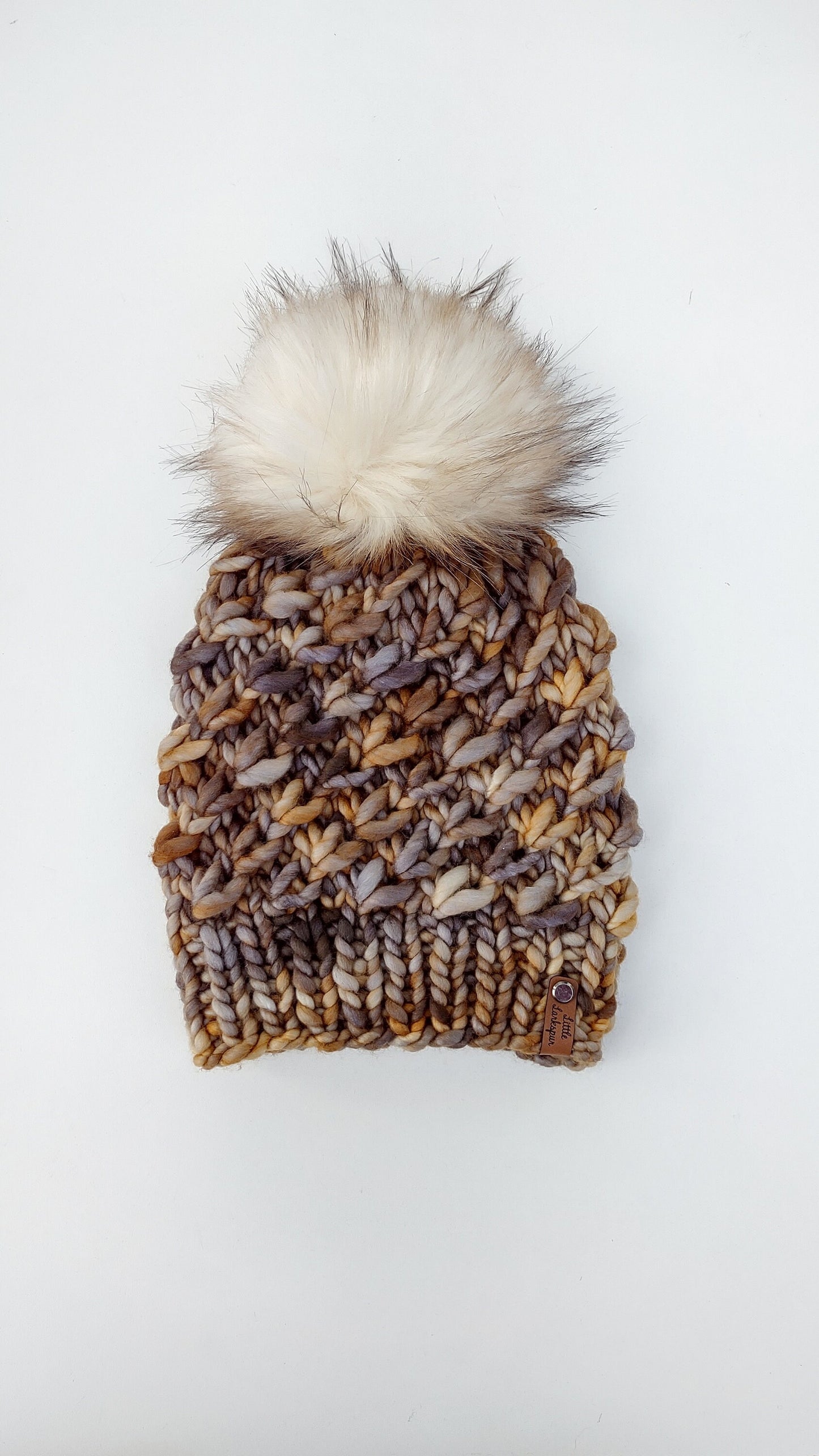 Luxury Adult Merino Wool Hand Knit Hat. Crush Hat. Soft hand knitted hat. Malabrigo Rasta. Honey Mocha brown beanie with faux fur pom pom.
