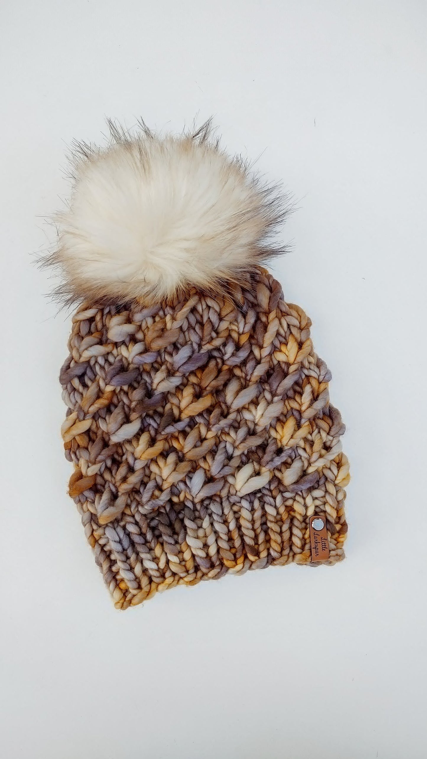 Luxury Adult Merino Wool Hand Knit Hat. Crush Hat. Soft hand knitted hat. Malabrigo Rasta. Honey Mocha brown beanie with faux fur pom pom.