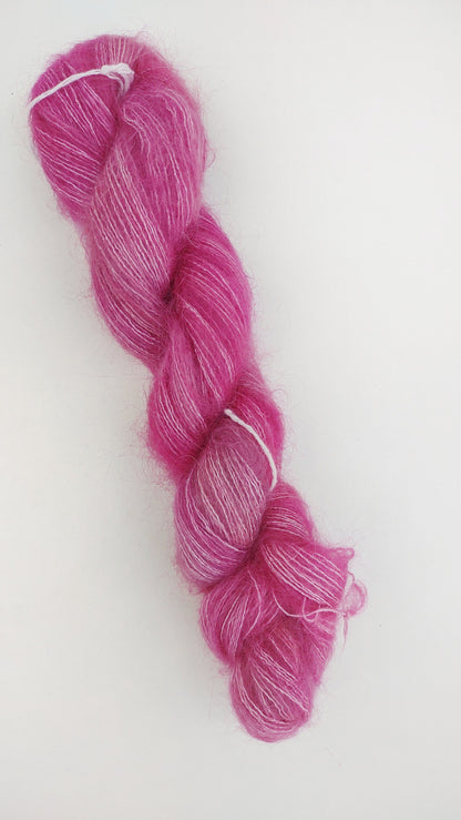 1 skein Malabrigo Mohair in English Rose. Soft super mohair/silk yarn. Deep pink yarn. Pattern NOT included. Knitting/crochet. Mohair/silk