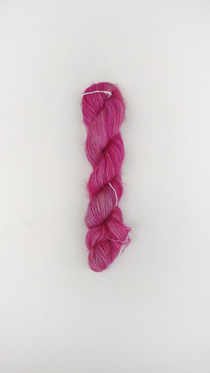 1 skein Malabrigo Mohair in English Rose. Soft super mohair/silk yarn. Deep pink yarn. Pattern NOT included. Knitting/crochet. Mohair/silk